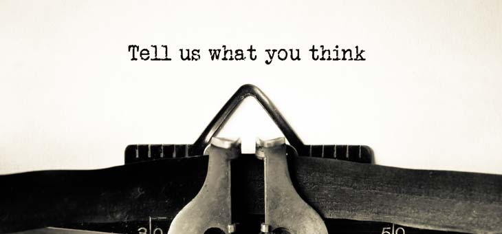 typewritten words saying tell us what you think